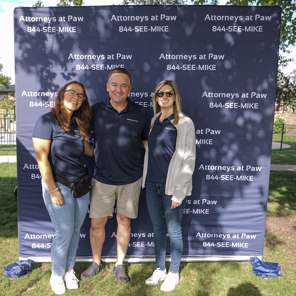 Image of Mike Agruss, Taylor Kosla Unterberg and Other Volunteer
