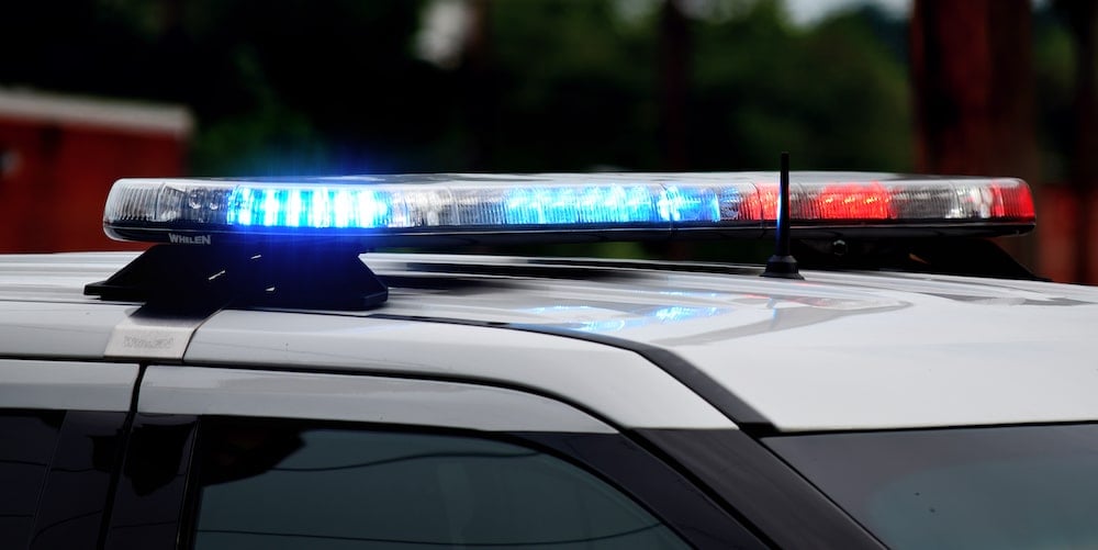Illinois Crash Report Codes: How to Read Your Police Report 1 Red and blue emergency lights on the roof of a police car
